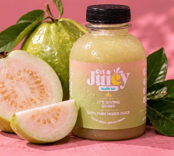 It's Giving Guava juice next to a cut guava